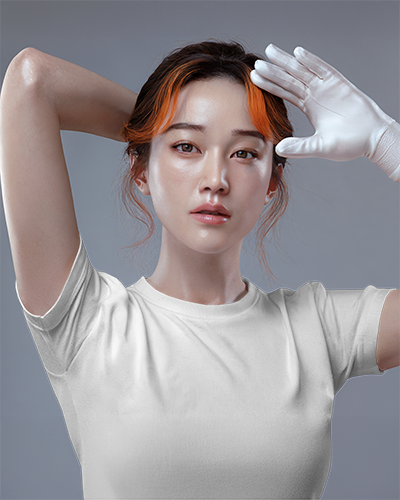 Editorial Closeup Tshirt Mockup Female Model With Gloved Hand And Orange Highlighted Hair On Grey Backdrop High Fashion Minimal Studio Look 0923