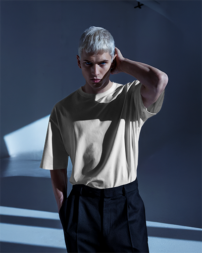 High Contrast Shadow Tshirt Mockup Male Model With Platinum Blonde Hair In Moody Lighting Contemporary Fashion Editorial Style 0928