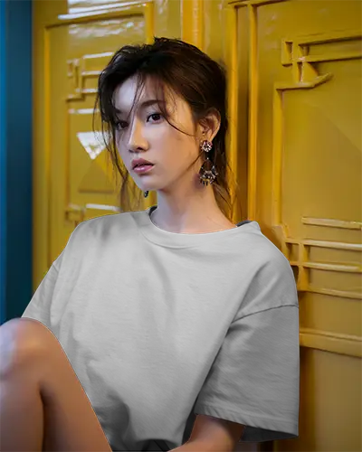 Oversized White Tshirt Mockup Female Model Relaxed Pose Industrial Yellow Door Background 