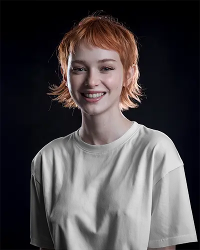 Oversized White Tee Mockup On Female Model Smiling In Dark Studio Soft Lighting 0938