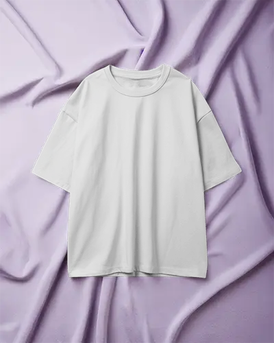 Front View T Shirt Mockup Boxy White Tee On Soft Lavender Fabric Draped Textile Background Gentle And Stylish Layout