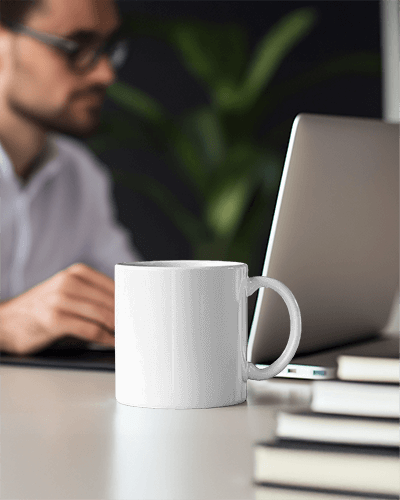Work Environment Mug Mockup Featuring Coffee Pow Exclamation And Silver Laptop