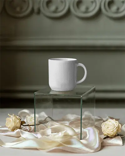 Minimalist Ceramic Mug Mockup On Transparent Glass Block With Luxury Fabric Background