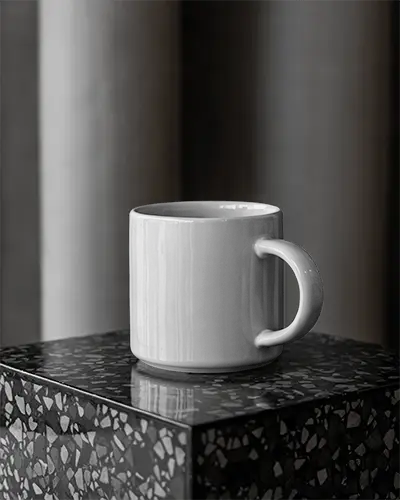 Ceramic Coffee Mug Mockup On Textured Surface With Soft Shadow Background For Design Display