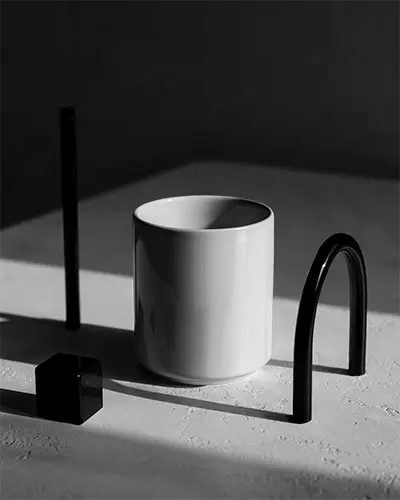 ceramic-mug-mockup-with-minimalistic-geometric-shapes-and-shadow-play-for-designers