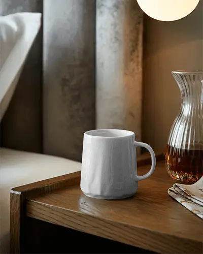 stylish-textured-mug-mockup-for-design-presentation-on-bedroom-nightstand