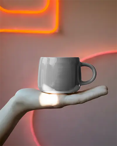 ceramic-mug-mockup-held-in-open-hand-simple-minimalist-design-display