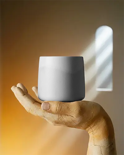 modern-minimalist-ceramic-mug-mockup-with-sculpted-hand-and-soft-natural-light-setting