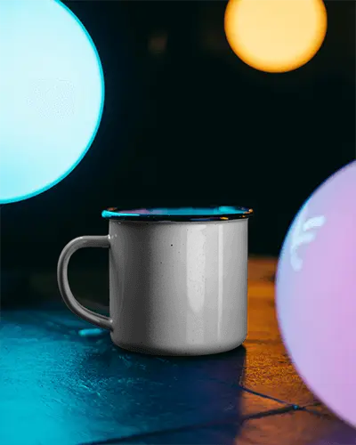 Stylish Metallic Mug Mockup With Handle Placed Among Glowing Spheres For Product Presentation