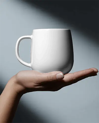 Elegant Minimalist Mug Mockup In Hand Showcasing Versatile Mockup For Product Promotion
