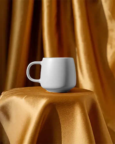 Rustic Ceramic Coffee Mug Mockup On Elegant Textured Fabric For Branding Design
