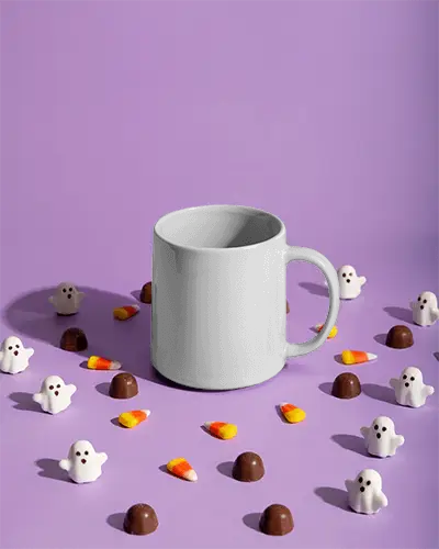 Halloween Coffee Mug Mockup With Candy Corns Chocolates And Ghost Decor Elements