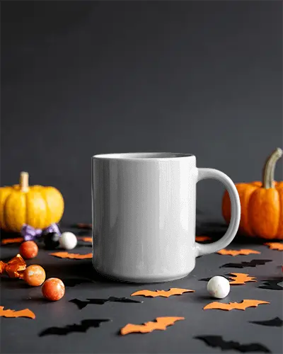 Halloween Mug Mockup With Pumpkin Bat Cuts And Sweets On Dark Surface