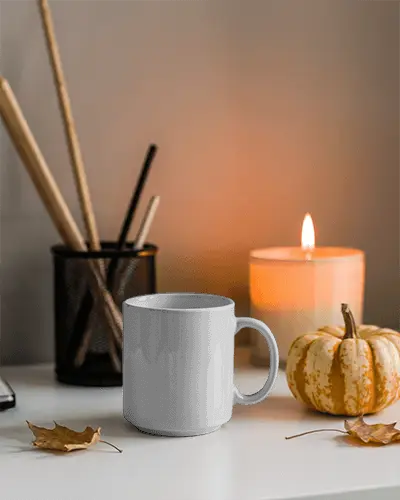 Halloween Mug Mockup With Pumpkin Candle And Fall Leaves Scene