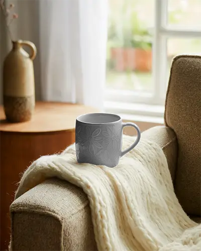 Stylish Ceramic Mug Mockup On Armrest With Knitted Blanket Living Room Window Light