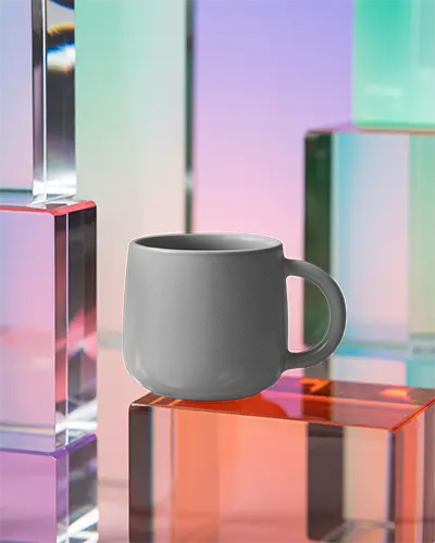 Sleek Stylish Handled Coffee Mug Mockup On Translucent Abstract Shaped Block Display