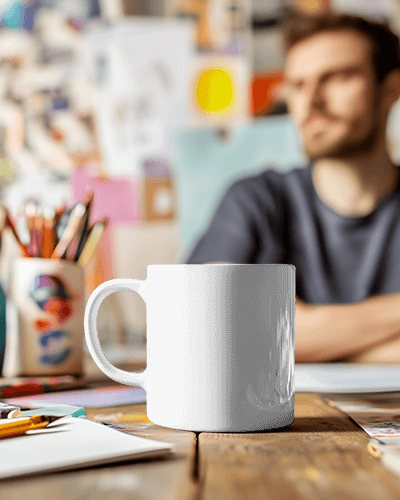 Artistic Watercolor Mug Mockup With You Got This Slogan On Wooden Desk In Creative Studio