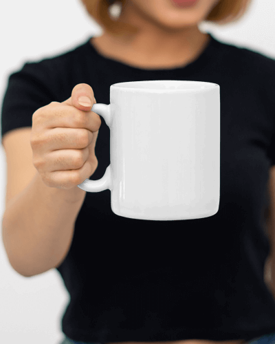 Woman Holding Mug Mockup With Focus On Design