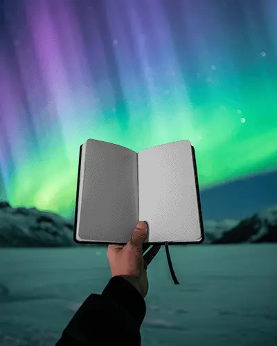 Aurora Borealis Open Notebook Mockup With Handheld View And Glowing Night Sky