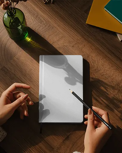 Creative Workspace Notebook Mockup With Pencil And Natural Light Shadows On Warm Wooden Desk