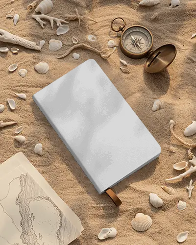 Coastal Adventure Notebook Mockup With Shells Map And Compass On Warm Sand