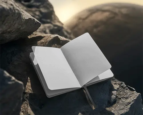 Open Notebook Mockup On Rocky Surface For Outdoor Writing And Journal Design Display
