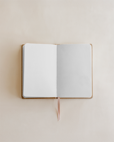 open-notebook-mockup-flat-lay-double-page-spread-on-light-cream-background-soft-shadow-with-pink-bookmark-elegant-and-minimal-design-showcase-032