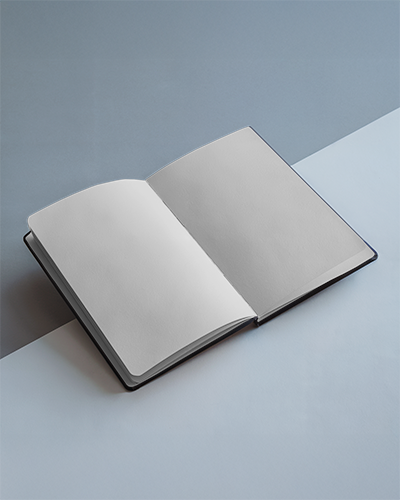 open-notebook-mockup-angled-view-double-page-layout-on-dual-tone-blue-background-modern-minimalist-style-with-soft-natural-lighting