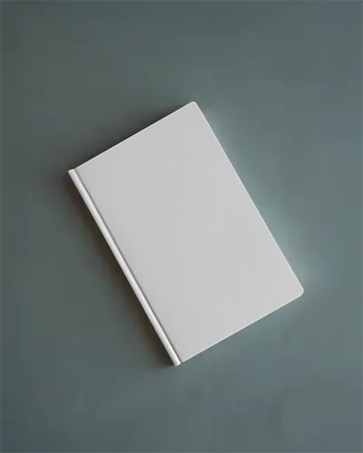 minimal-hardcover-notebook-mockup-top-view-angled-on-muted-blue-surface-clean-and-elegant-stationery-presentation-045