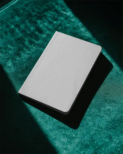 sleek-hardcover-notebook-mockup-on-textured-surface-for-professional-journaling-and-daily-planning