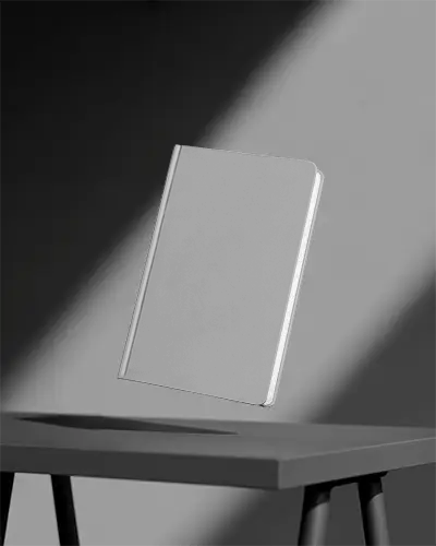 levitating-notebook-mockup-display-with-sharp-contrast-light-shadow-for-design-presentation