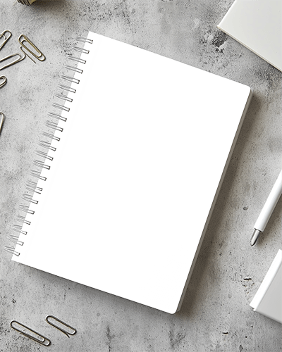 Grayscale Stationery Notebook Mockup On Concrete Surface Surrounded By Paper Clips And Pen Industrial Design