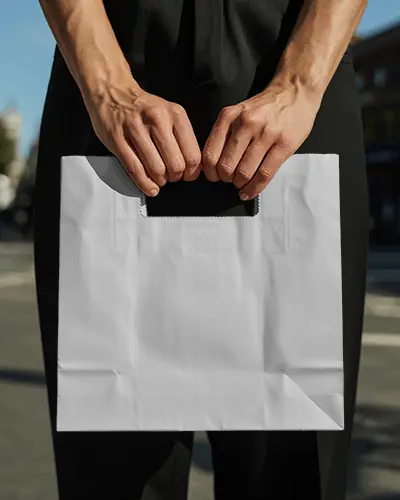 Sustainable Paper Bag Mockup With Cut Out Handle For Retail Packaging And Brand Presentation