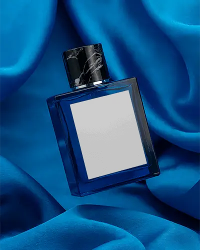 Elegant Blue Square Perfume Bottle Mockup On Satin Background