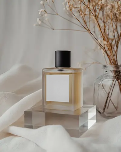 Elegant Perfume Mockup On Transparent Pedestal With Delicate Dried Flowers Background