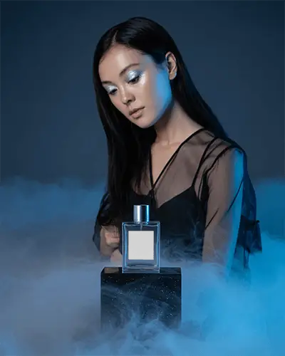 Ethereal Perfume Mockup Female Model In Sheer Black Dress Blue Fog And Studio Lighting