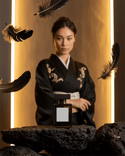 Halloween Perfume Mockup Elegant Woman In Black Kimono With Floating Feathers And Golden Light