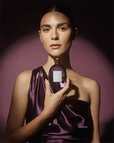 Elegant Perfume Bottle Mockup With Luxurious Fabric And Soft Light For Brand Presentation