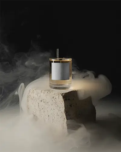 Luxury Perfume Bottle Mockup On Natural Stone With Mystical Smoky Background For Branding
