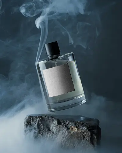 Elegant Glass Perfume Mockup Hovering Above Stone In Enigmatic Smoke Background