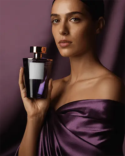 Luxury Elegant Perfume Mockup With Glass Bottle Holding Model For Fragrance Brand Promotion