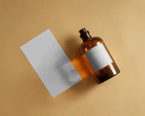 Flat Lay Perfume Mockup Amber Glass Bottle With Box Warm Gold Studio Background
