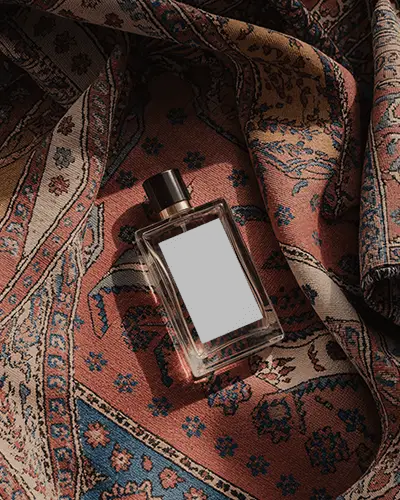 Elegant Fragrance Mockup Premium Perfume Display On Vintage Rug Pattern Fabric