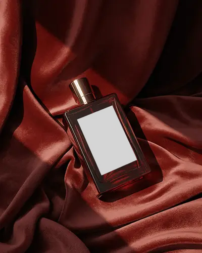 luxury-red-glass-perfume-mockup-on-satin-fabric-soft-lighting-premium-product-display