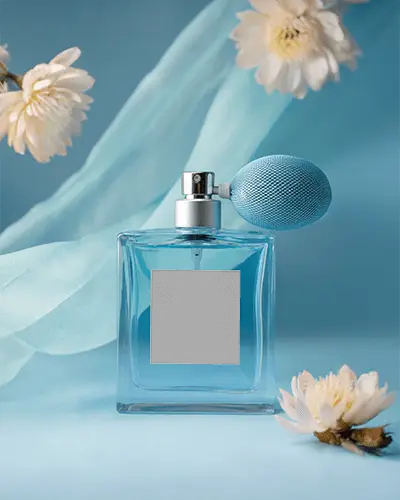 elegant-perfume-mockup-blue-glass-bottle-with-spray-bulb-surrounded-by-soft-flowers-and-fabric