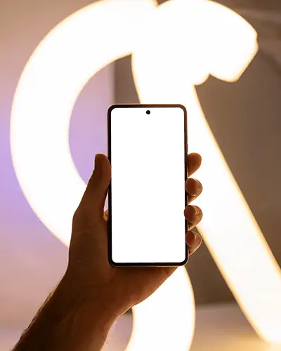 Illuminated Background Phone Mockup Hand Holding Smartphone In Modern Art Light Display