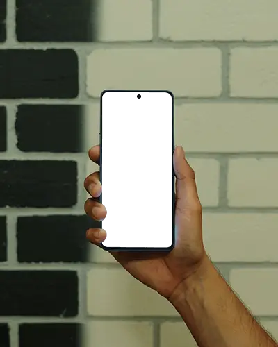 realistic-huawei-android-phone-mockup-held-in-hand-against-brick-wall-front-screen-display