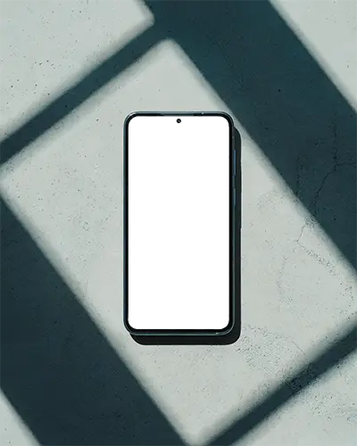Android Mobile Phone Mockup On Concrete Surface With Crisp Sunlit Shadows For Bold And Minimal Design Presentation