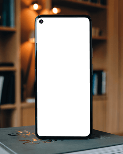 Bookshelf Background Smartphone Mockup Upright On Table In Cozy Interior With Warm Lighting