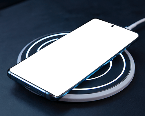Charging Smartphone Mockup On Wireless Pad Minimalist Setup Soft Lighting Tech Focus